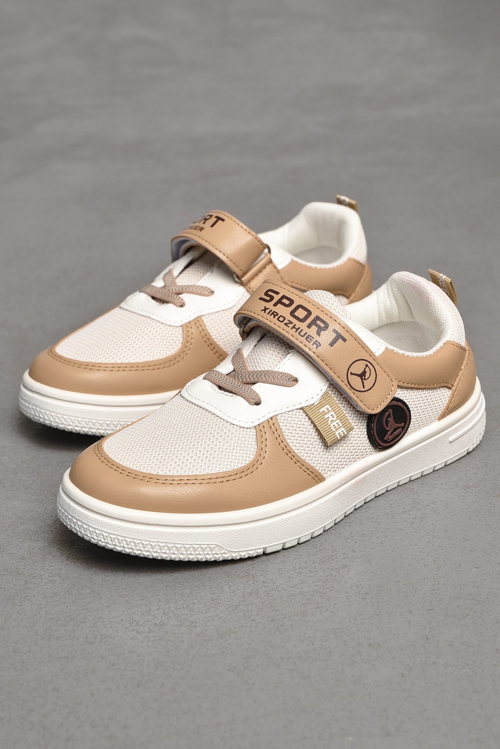 Фото товару Кросівки дитячі бежевого кольору №1