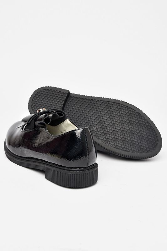 Фото товару Туфлі дитячі для дівчинки чорного кольору