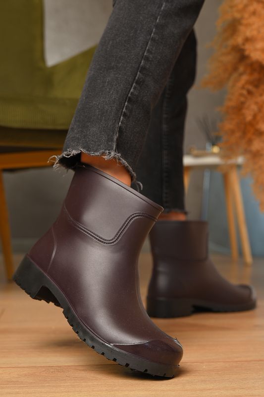 Фото товару Чоботи гумові низькі жіночі темно-фіолетового кольору №1 thumbnail